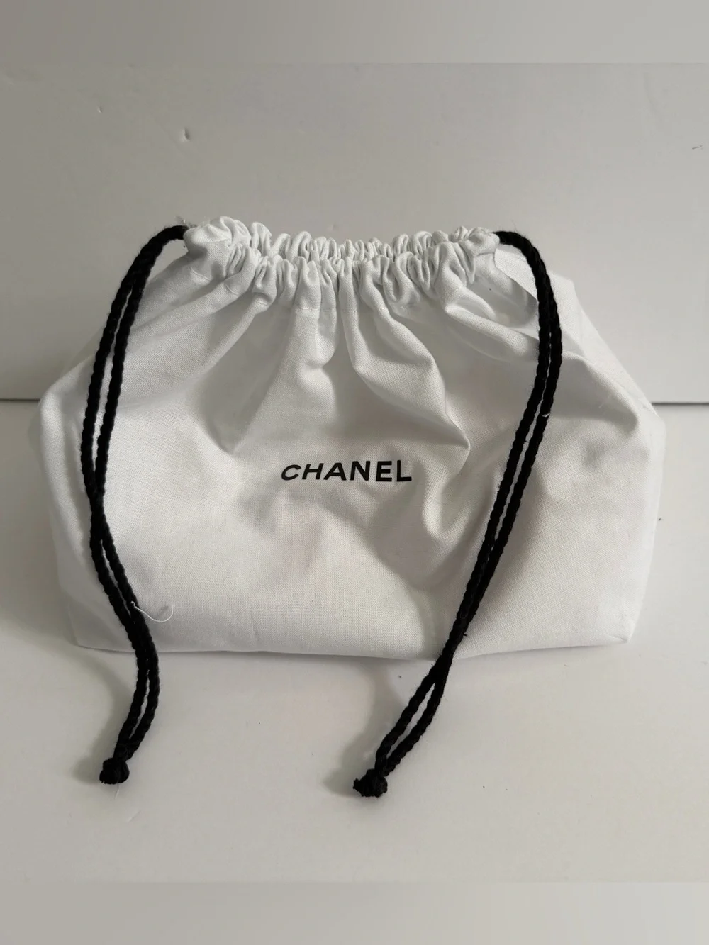 CHANEL White Cotton Drawstring Pouch with Black Cords - Picture 1 of 3